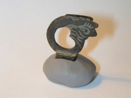 viking gaming piece ornament placed on clay